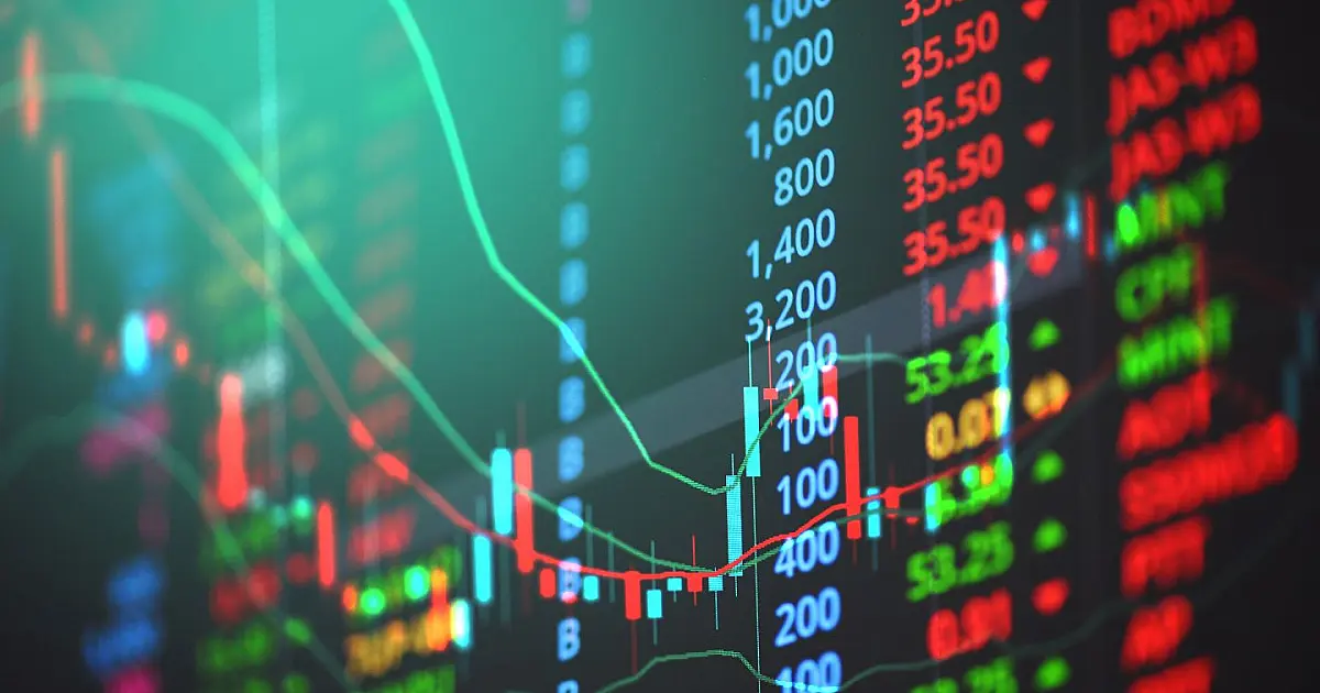 Gráficos financeiros representando movimentação da Bolsa de Valores e investimentos no mercado de ações