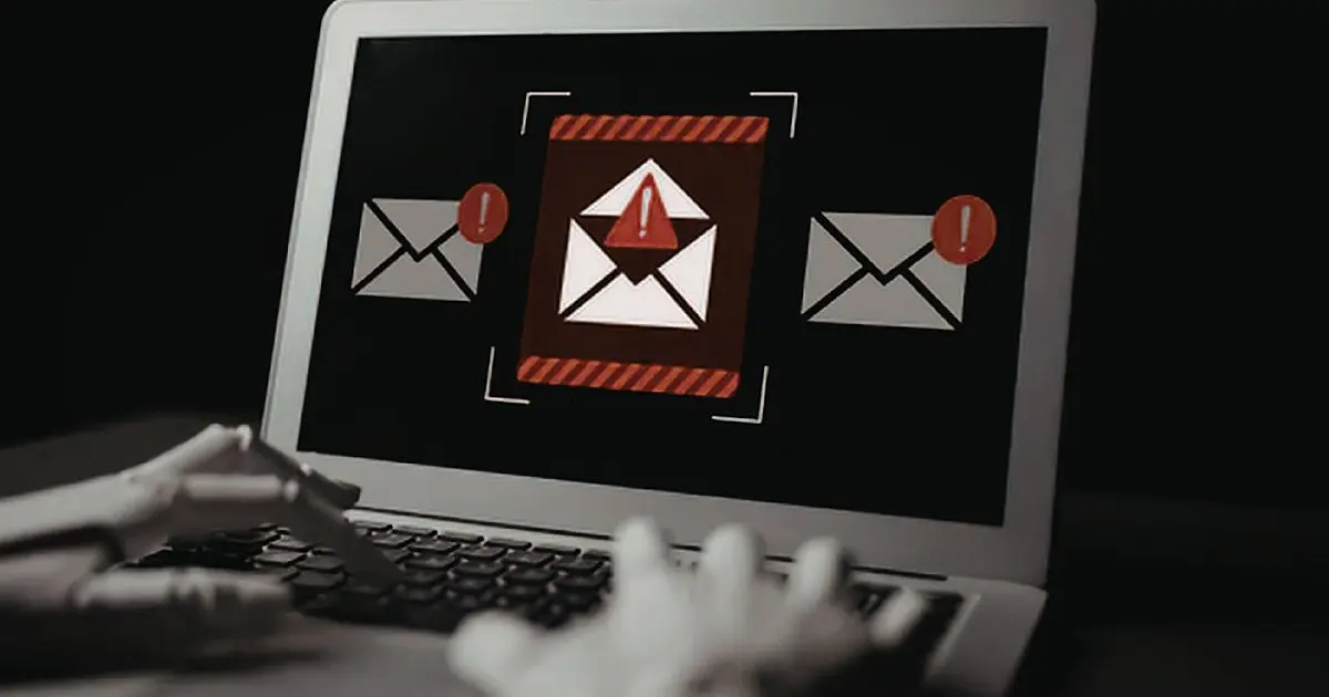 Ilustração representando tentativa de golpe financeiro com alerta em tela de computador